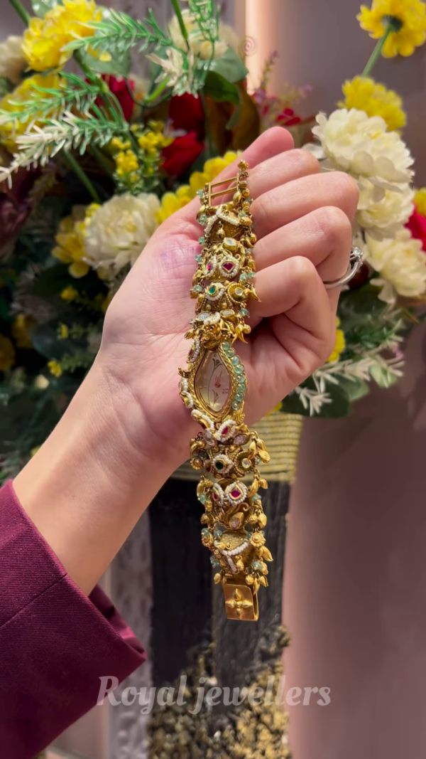 Exquisite Gold-Toned Watch with Elaborate Detailing
